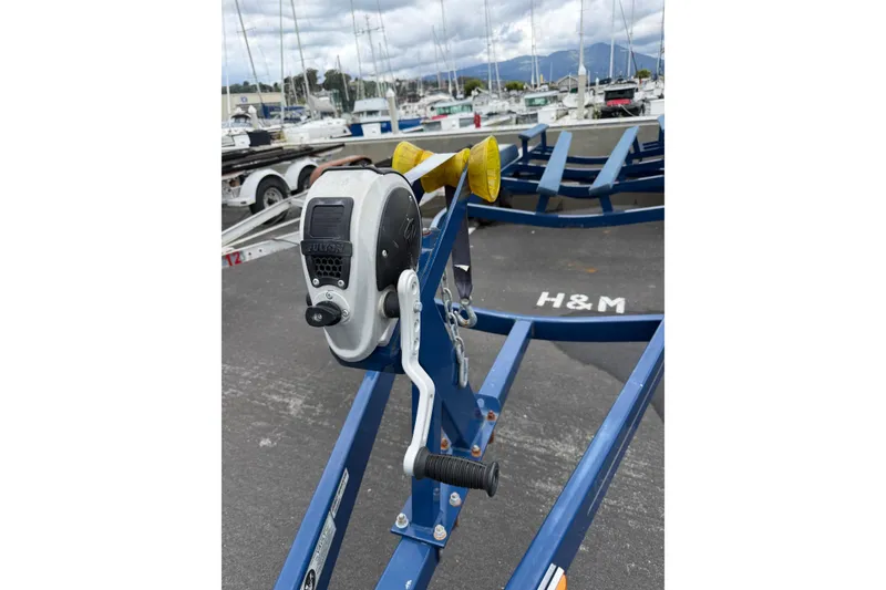 Slide: The Image of Boat trailer winch at marina, Crownline 255 SS SURF, 2022 model. - 43