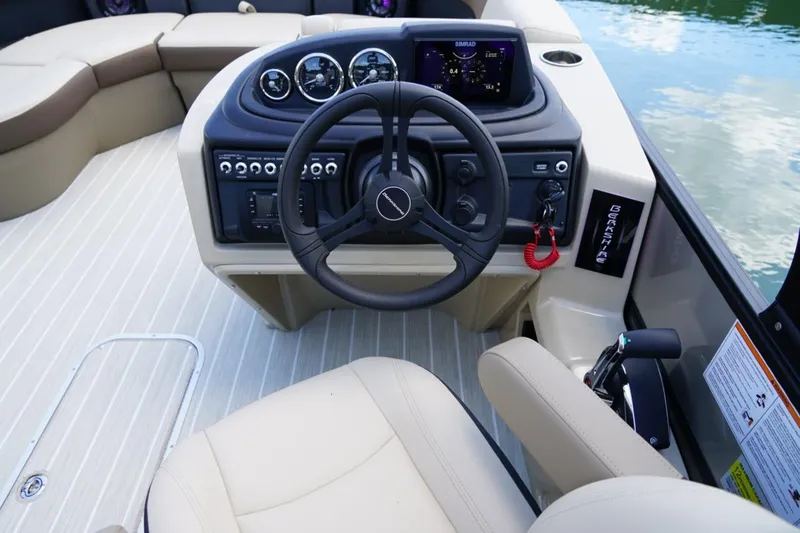 Slide: The Image of Cockpit of 2026 Berkshire 22 UL CTS boat with modern steering and controls. - 21