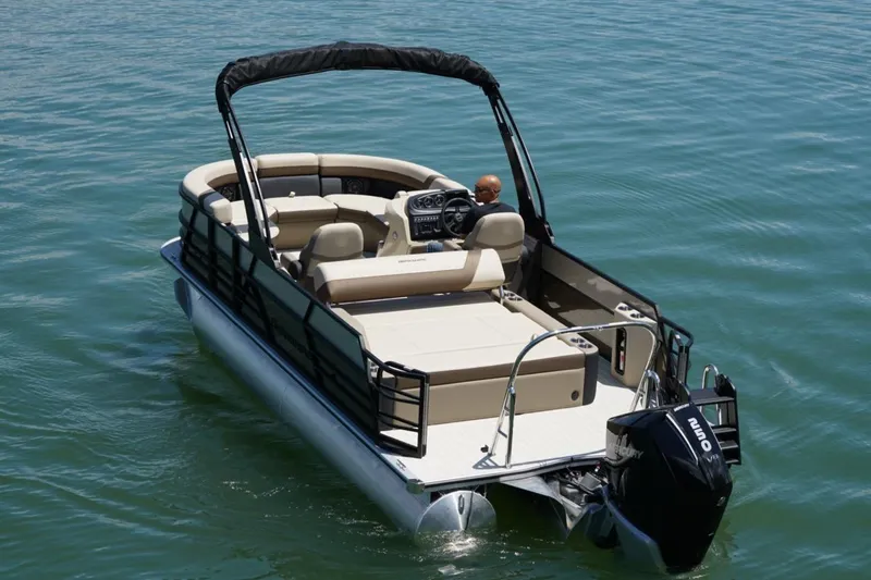 Slide: The Image of 2026 Berkshire 22 UL CTS pontoon boat on water, featuring spacious seating and modern design. - 3