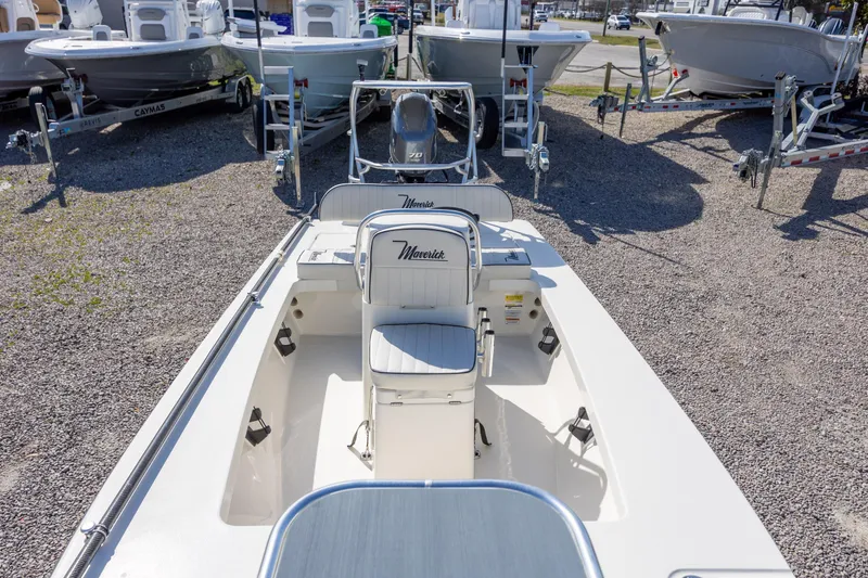 Slide: The Image of 2024 Maverick 17 HPX-S boat displayed in a dealership lot, showcasing sleek design. - 13