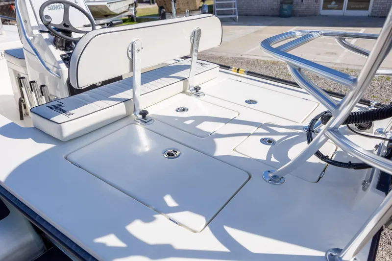 Slide: The Image of 2024 Maverick 17 HPX-S boat interior with seating and storage compartments. - 16