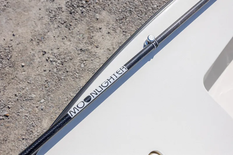 Slide: The Image of 2024 Maverick 17 HPX-S boat detail with "Moonlighter" text on carbon fiber rod. - 18