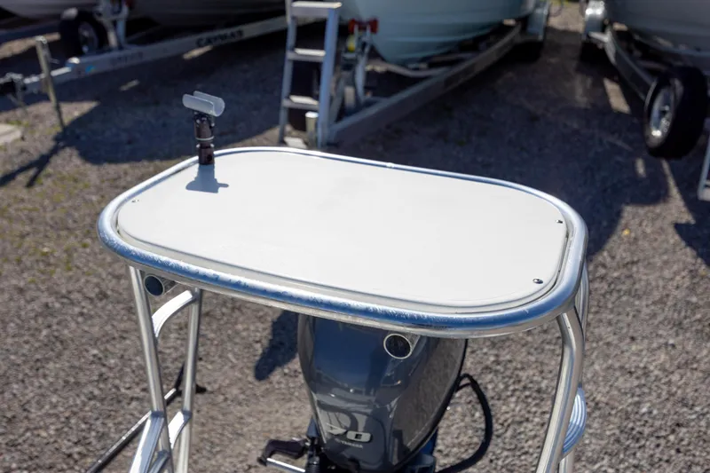 Slide: The Image of 2024 Maverick 17 HPX-S boat with a sleek control panel and outboard motor. - 19