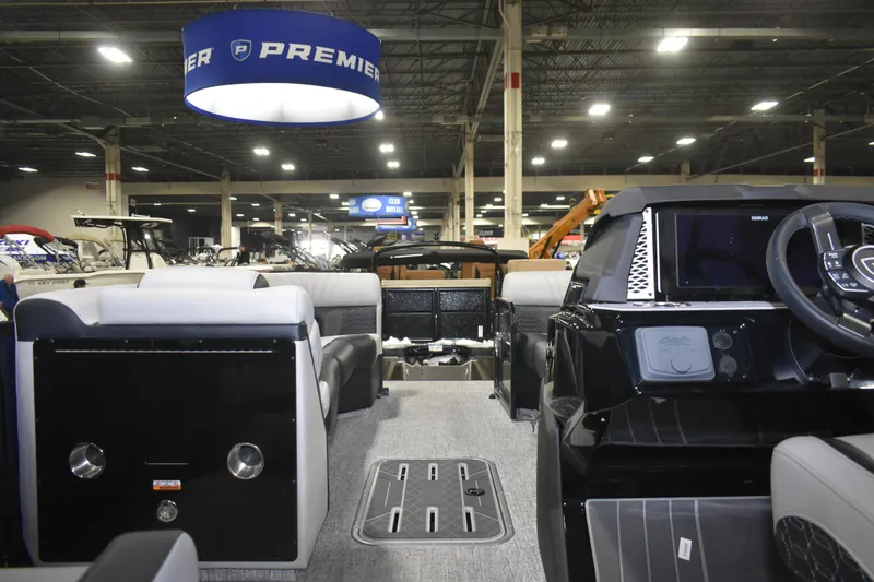 Slide: The Image of Interior view of 2026 Premier 250 Intrigue RLO - CL boat at an indoor exhibition. - 15