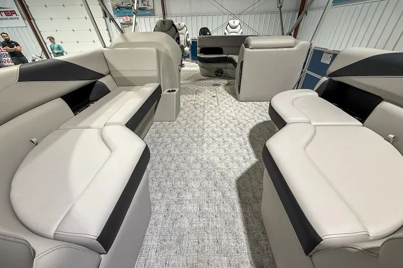 Slide: The Image of 2025 Trifecta 24TRFC LE pontoon boat interior with plush seating and modern design. - 10
