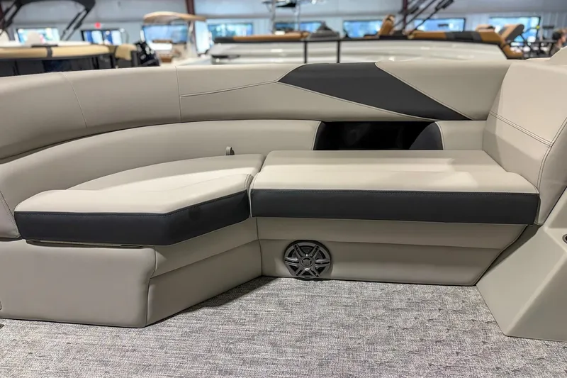 Slide: The Image of 2025 Trifecta 24TRFC LE boat interior with sleek, modern seating and integrated speaker. - 9