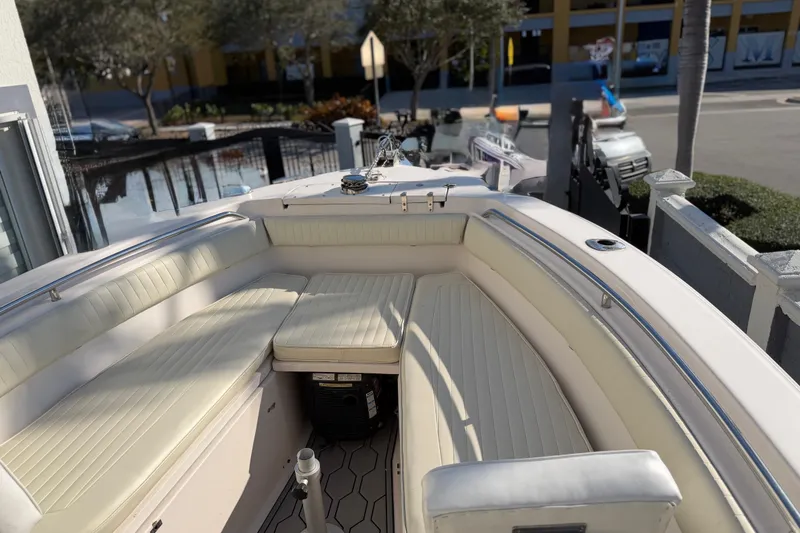 Slide: The Image of 2004 Grady White 273 boat with spacious seating and sleek design. - 100