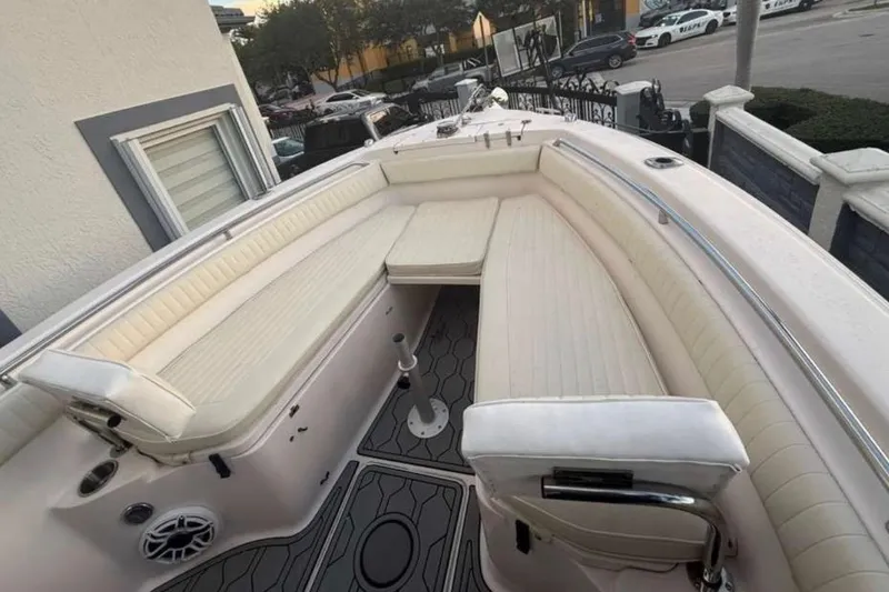 Slide: The Image of 2004 Grady-White Chase 273 boat with spacious seating and modern design. - 103