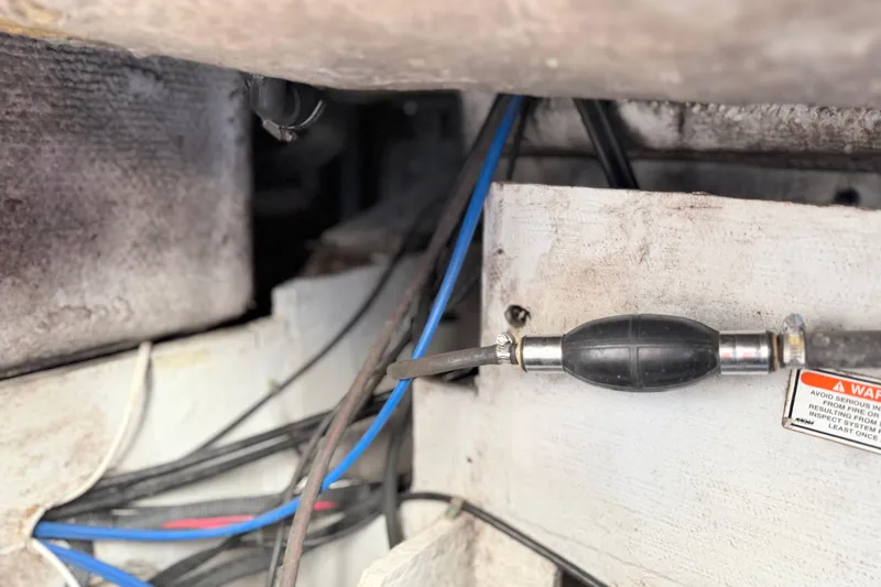 Slide: The Image of 2004 Grady White 273 boat wiring and fuel line detail. - 149