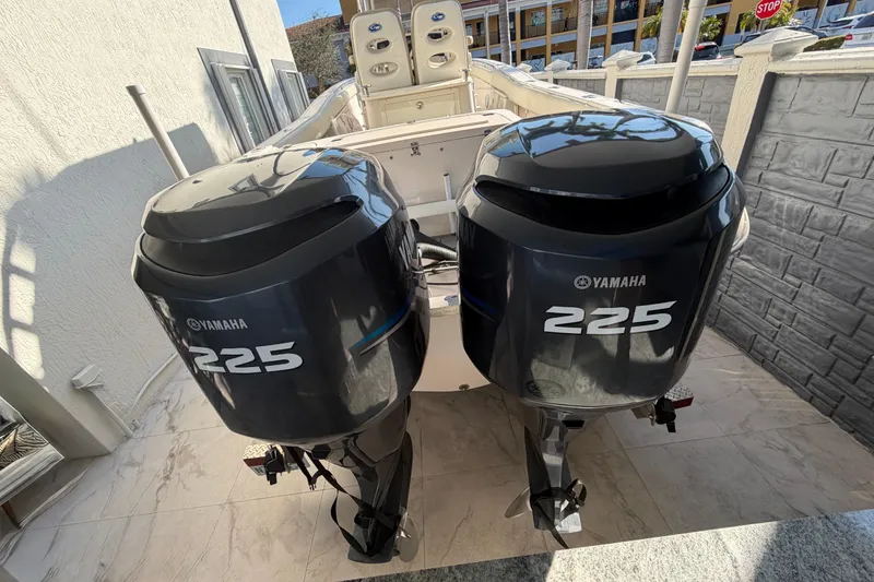 Slide: The Image of 2004 Grady White 273 boat with dual Yamaha 225 outboard engines. - 26