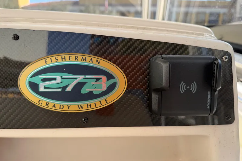 Slide: The Image of 2004 Grady White 273 Fisherman boat emblem with Sonar unit. - 77