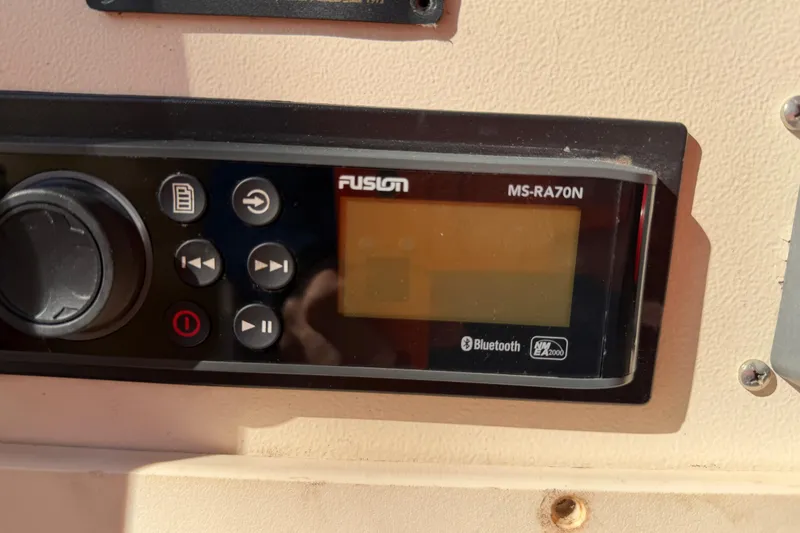 Slide: The Image of Fusion MS-RA70N stereo system on 2004 Grady White 273 boat dashboard. - 91