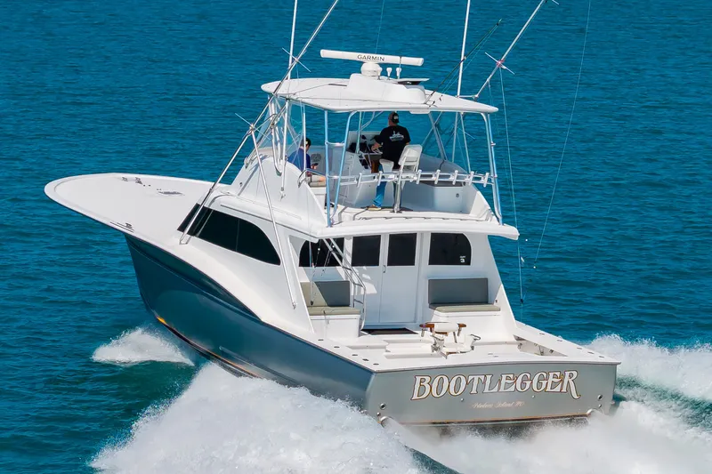 Slide: The Image of A 2000 Custom Carolina Terry Guthrie Sportfish speeding on the ocean. - 3