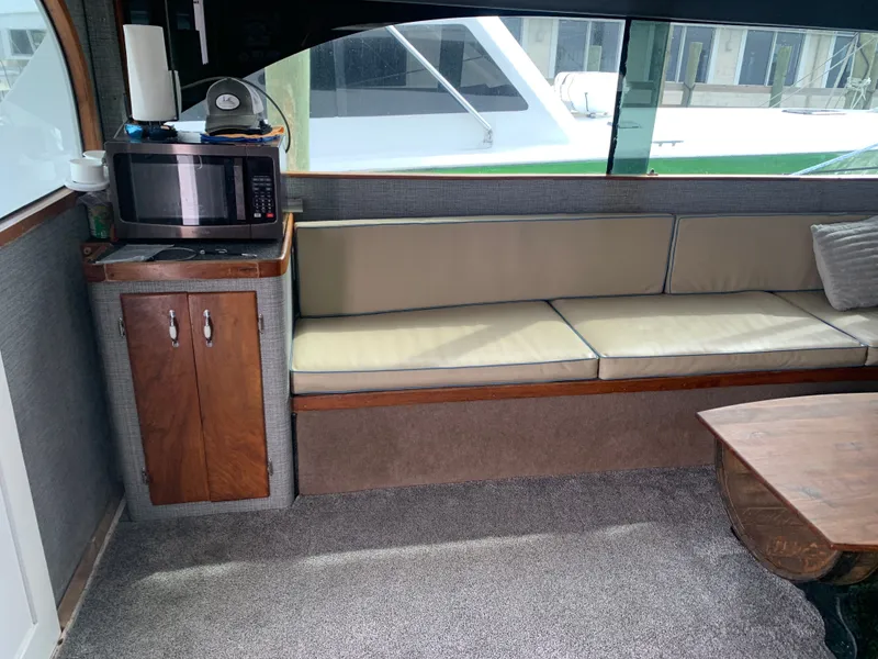 Slide: The Image of Helm of Custom Carolina Terry Guthrie Sportfish 2000 on open sea. - 14