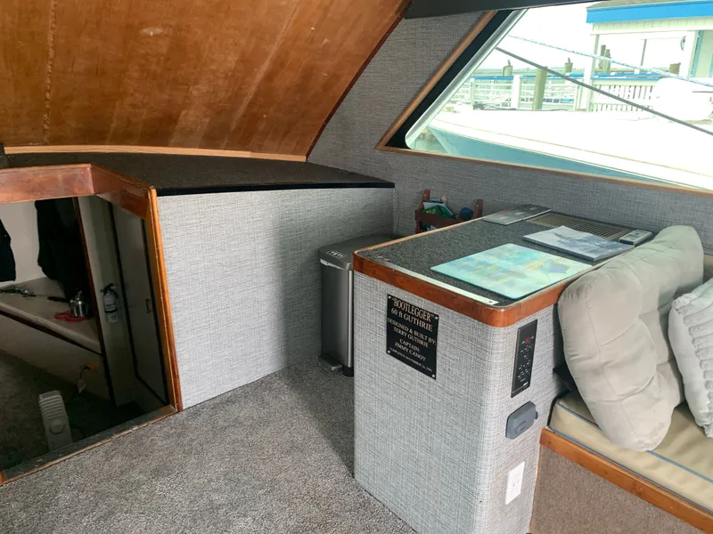 Slide: The Image of Interior of a 2000 Custom Carolina Terry Guthrie Sportfish on the water. - 17
