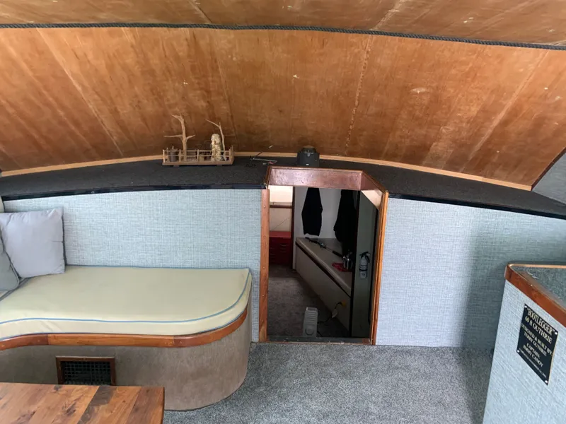 Slide: The Image of Helm of Custom Carolina Terry Guthrie Sportfish 2000 on open sea. - 19