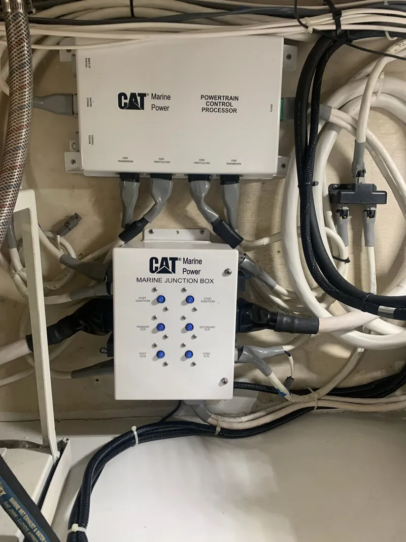 Slide: The Image of Interior of 2000 Custom Carolina Terry Guthrie Sportfish with stairs and utility area. - 24