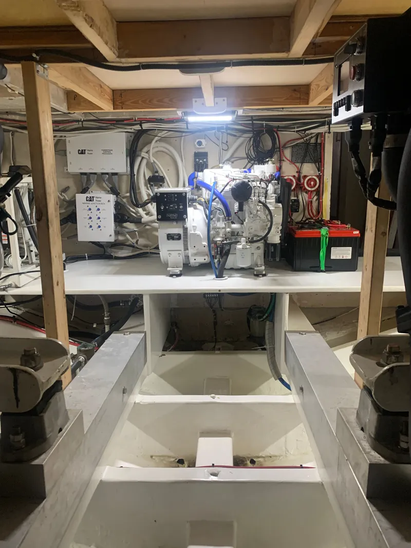 Slide: The Image of Engine room of Custom Carolina Terry Guthrie Sportfish 2000. - 26