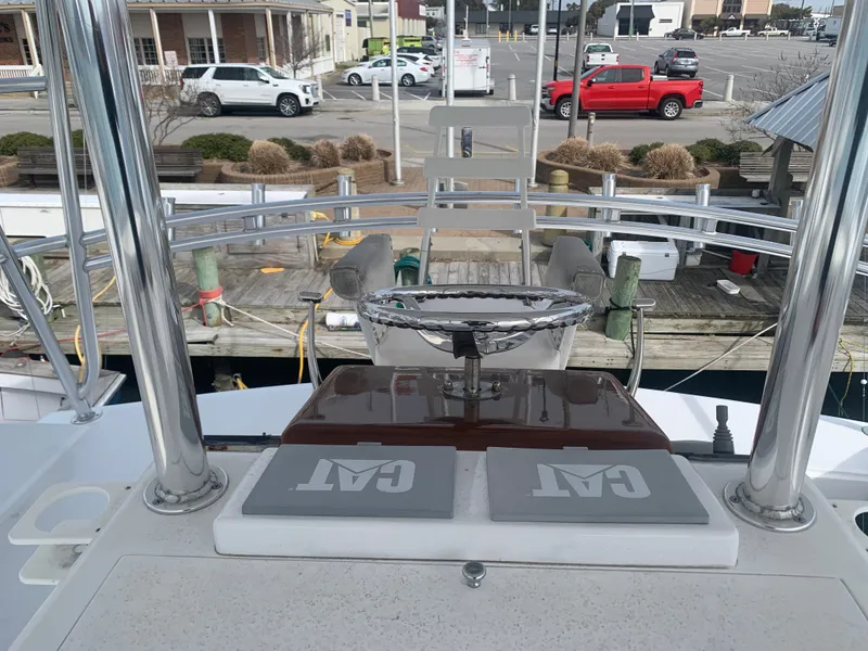 Slide: The Image of Custom Carolina Terry Guthrie Sportfish 2000 cruising on the ocean. - 3