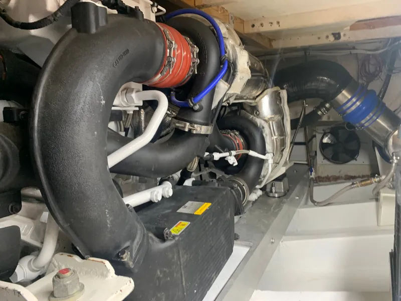 Slide: The Image of Engine room of a Custom Carolina Terry Guthrie Sportfish 2000 boat. - 33