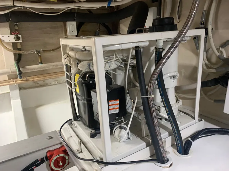 Slide: The Image of Interior of Custom Carolina Terry Guthrie Sportfish 2000 with fishing rods. - 40