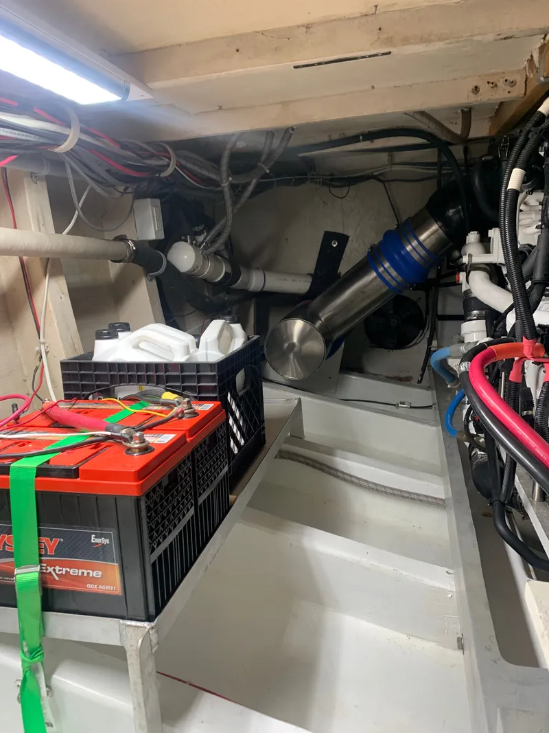 Slide: The Image of Interior of Custom Carolina Terry Guthrie Sportfish 2000 with fishing rod holders. - 44