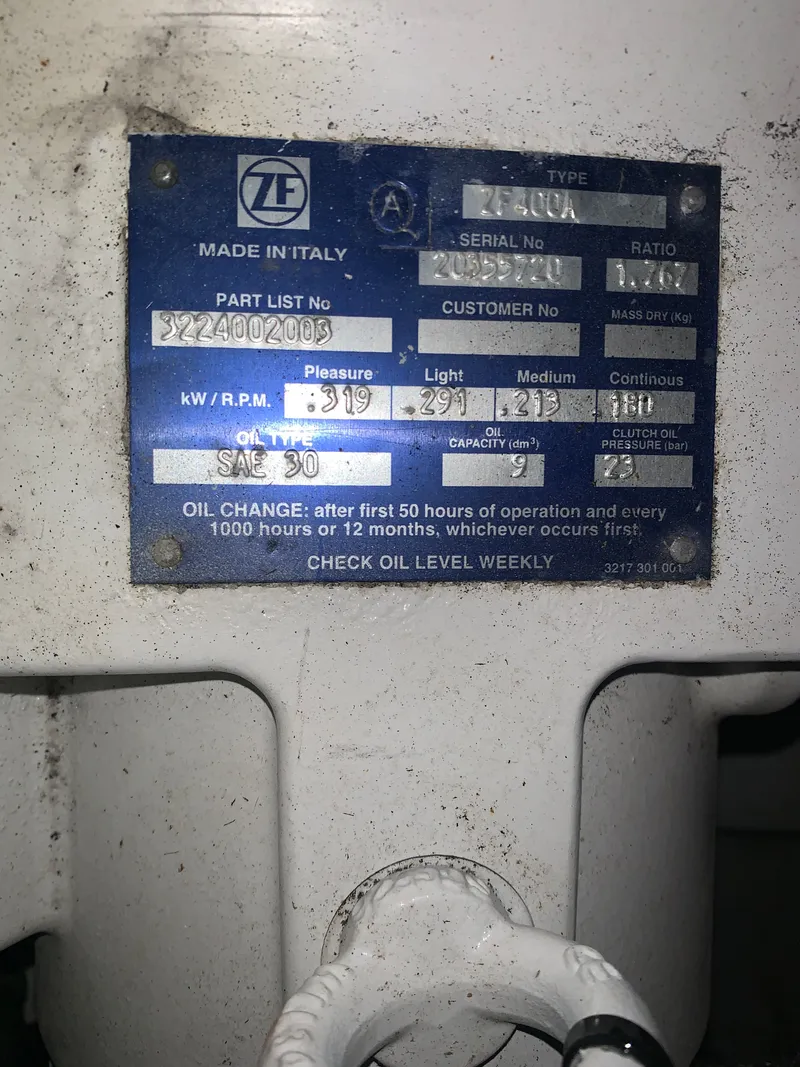 Slide: The Image of Interior of Custom Carolina Terry Guthrie Sportfish 2000 with fishing rods. - 45