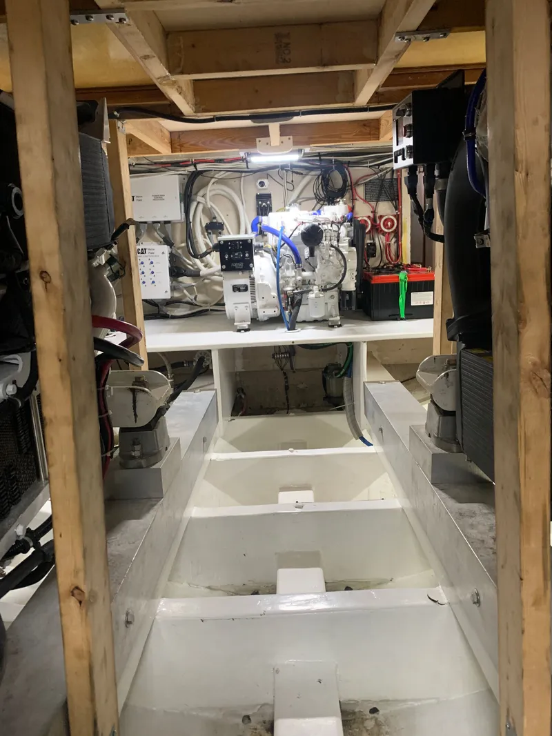 Slide: The Image of Custom Carolina Terry Guthrie Sportfish 2000 cruising on open sea. - 48