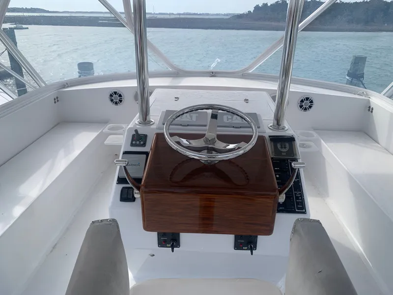 Slide: The Image of Custom Carolina Terry Guthrie Sportfish 2000 cruising on the ocean. - 5