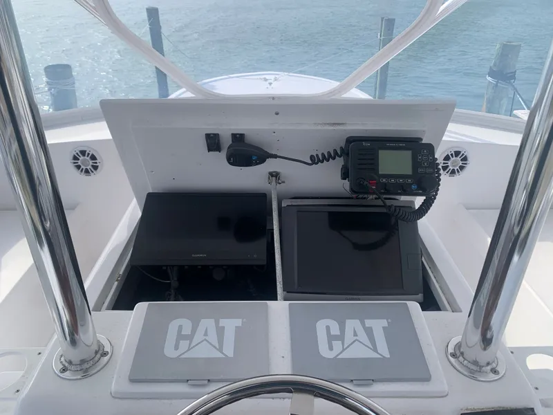 Slide: The Image of Custom Carolina Terry Guthrie Sportfish 2000 cruising on open sea. - 6