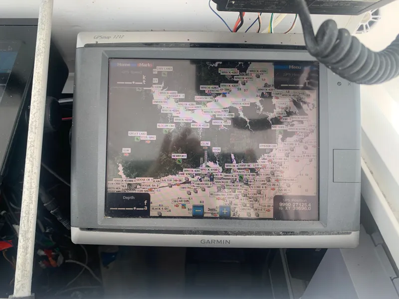 Slide: The Image of Custom Carolina Terry Guthrie Sportfish 2000 cruising on open sea. - 8