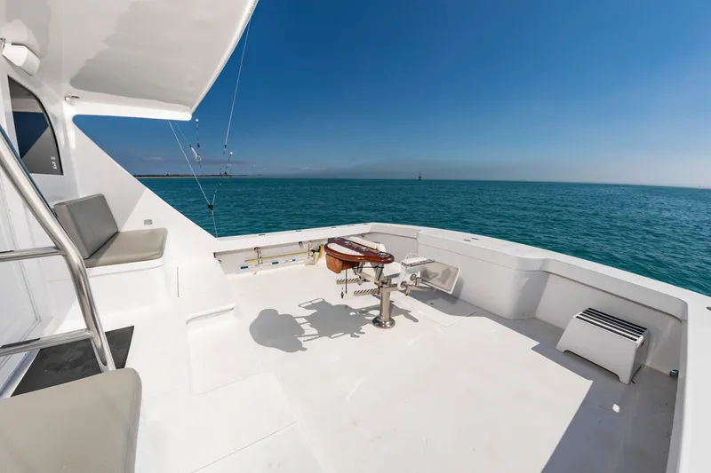 Slide: The Image of The image shows the spacious aft deck of a 2000 Custom Carolina Terry Guthrie Sportfish. - 10