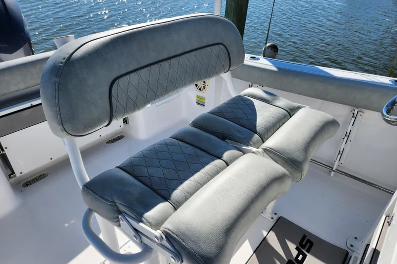 Slide: The Image of 2020 Sportsman Open 232 Center Console boat seating with quilted upholstery. - 13