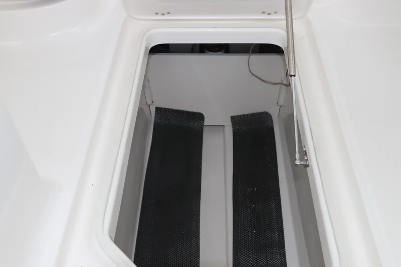Slide: The Image of 2026 Robalo R257 Dual Console boat throttle controls with sleek design and modern features. - 38