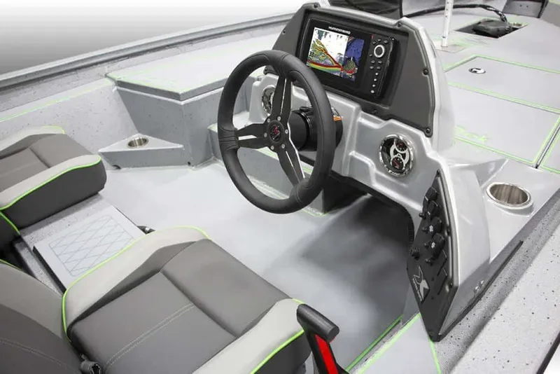 Slide: The Image of Manufacturer Provided Image: 2026 Xpress H18 boat interior with steering wheel, navigation system, and seating. - 9