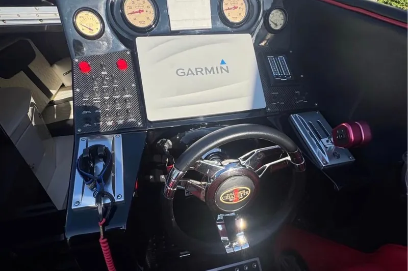 Slide: The Image of Cockpit of 2018 Cigarette 42X boat with Garmin navigation system and gauges. - 10