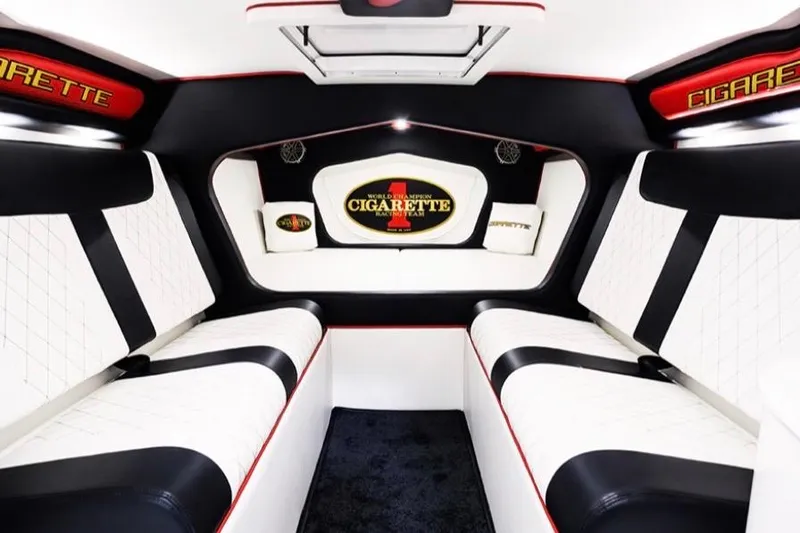 Slide: The Image of Luxurious interior of 2018 Cigarette 42X boat with white and black seating. - 12