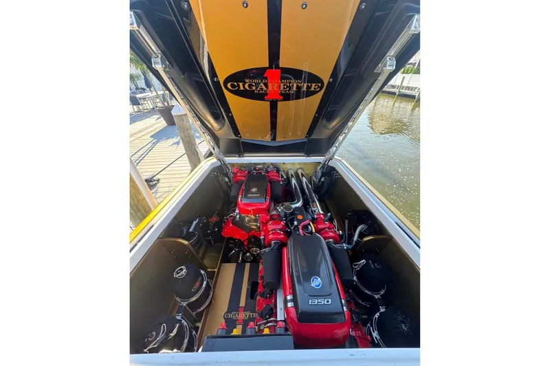 Slide: The Image of 2018 Cigarette 42X boat engine compartment with powerful Mercury 1350 engines. - 18