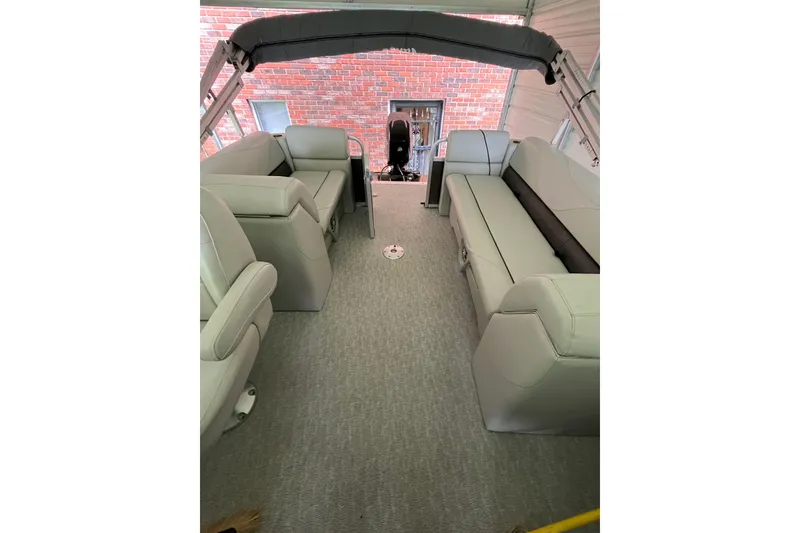 Slide: The Image of 2020 Tahoe Pontoon Sport Cruise Rear Bench 18' interior with plush seating. - 11