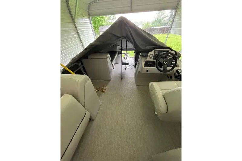 Slide: The Image of 2020 Tahoe Pontoon Sport Cruise Rear Bench 18' interior under cover. - 8