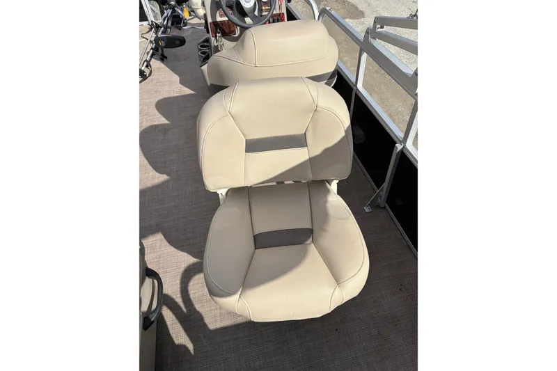 Slide: The Image of 2022 Sun Tracker Bass Buggy 18 DLX boat seats, beige upholstery, top view. - 15