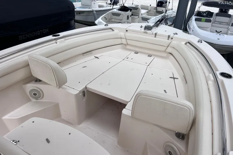 Slide: The Image of 2018 Grady-White Fisherman 236 boat interior with seating and storage compartments. - 1