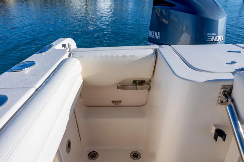 Slide: The Image of 2018 Grady-White Fisherman 236 boat with Yamaha 300 engine on calm water. - 18