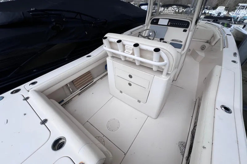 Slide: The Image of 2018 Grady-White Fisherman 236 boat interior with seating and storage compartments. - 4
