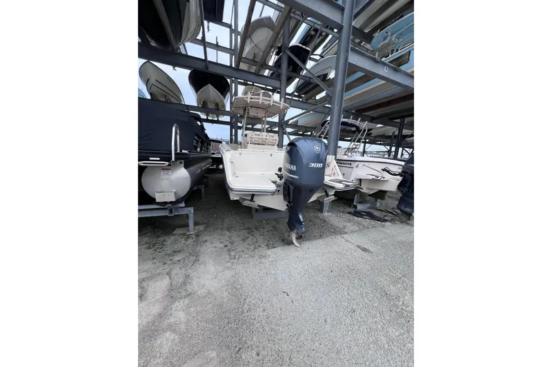 Slide: The Image of 2018 Grady-White Fisherman 236 boat in storage, featuring Yamaha 300 outboard motor. - 8