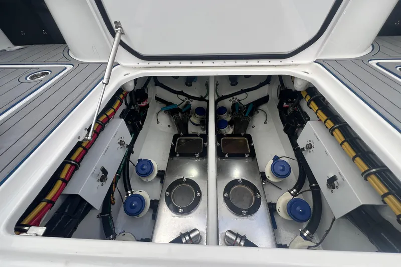 Slide: The Image of 2024 Nor-Tech 392 Super Fish engine compartment, showcasing advanced marine engineering and wiring. - 4