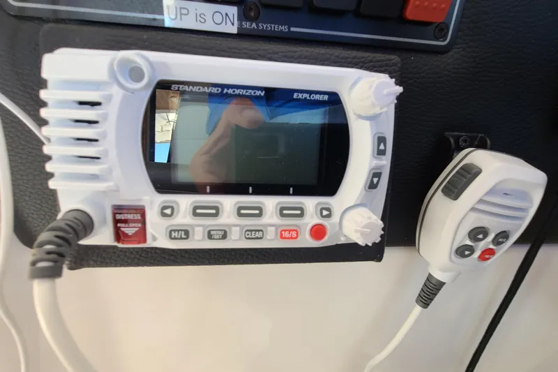 Slide: The Image of Standard Horizon Explorer radio on 2019 Cutwater C-28 LE boat dashboard. - 17