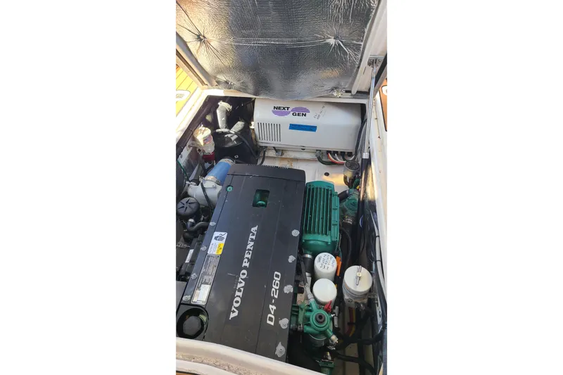 Slide: The Image of 2019 Cutwater C-28 LE engine compartment with Volvo Penta D4-260 and Next Gen generator. - 7