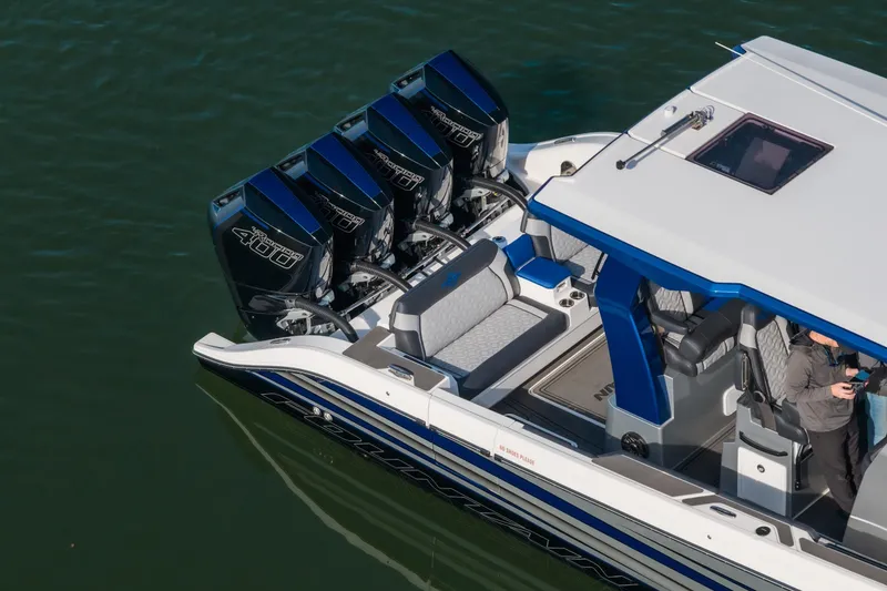 Slide: The Image of 2025 Fountain 43 SCX boat with quad Mercury 400R engines on water. - 11