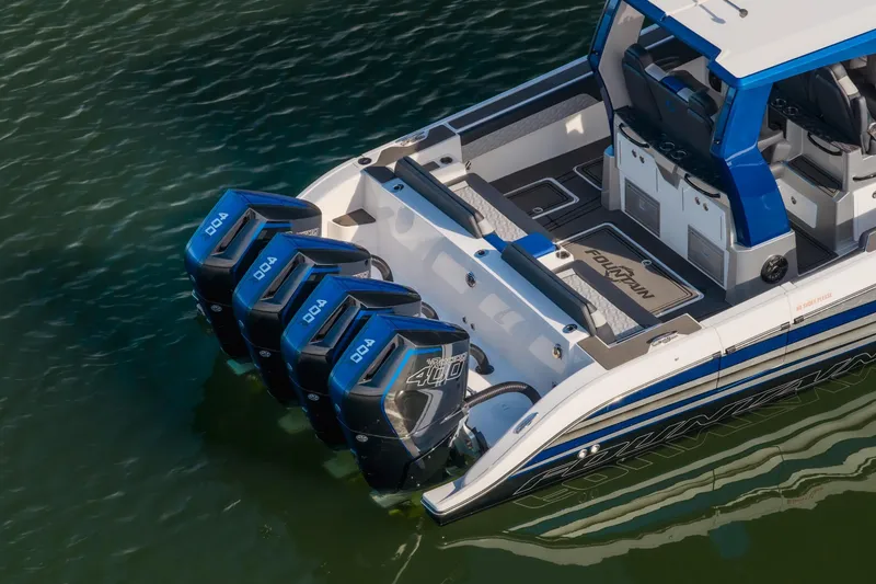 Slide: The Image of 2025 Fountain 43 SCX boat with quad 400 horsepower engines on water. - 13